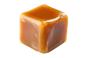 Freshly made caramel cube glistening under soft lighting, showcasing its rich, golden color png