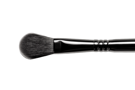 fechar-se do uma Maquiagem escova com uma suave pêlos cabeça contra uma avião fundo png