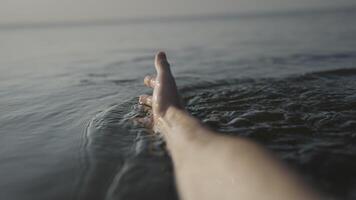 A Serene Foot in Water at Dusk, Embracing the Twilight Calm video