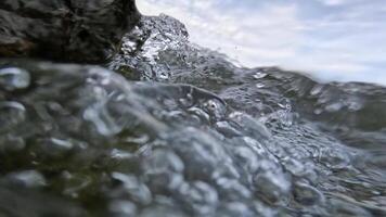 Seashore with waves and pebbles video