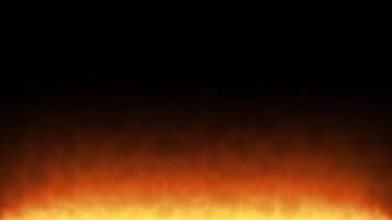 Fire burns low on black background with copy space video