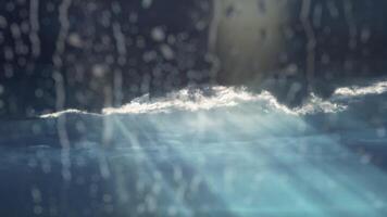 Rain on the window with dark clouds behind video