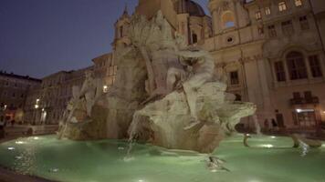 Famous Fountain of Four Rivers statue with illuminated water video