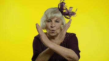 Senior old woman asking to stop and showing restrict gestures with hands displeased with something video