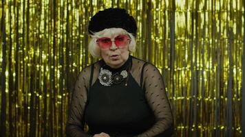 Don't do it. Senior old woman asking to stop and showing restrict gestures with hands video