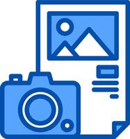 A blue camera and paper with a photo on it vector