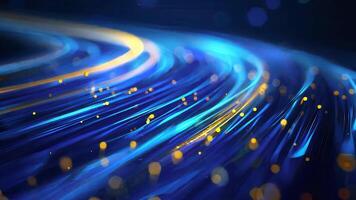 Vibrant abstract light trails in blue and gold, creating a mesmerizing flowing pattern with a soft bokeh effect. video
