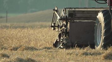 Close-up of a Combine Harvester Working in a Field video