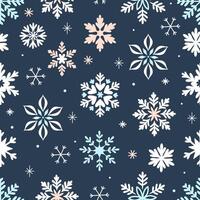 Seamless pattern with snowflakes of different shapes on a blue background. graphics. vector