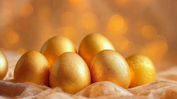 A bunch of golden eggs sitting on top of a table video