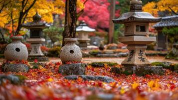 Stone Lanterns in a Japanese Garden with Autumn Leaves photo