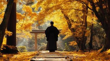Man in Traditional Japanese Clothing Standing in Autumn Forest photo