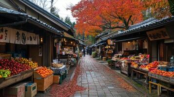 A Narrow Japanese Street Lined with Shops and Autumn Foliage photo