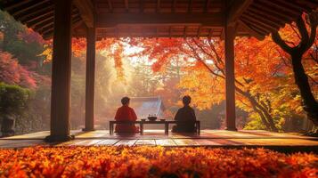 Two People Silhouetted in a Wooden Pavilion Surrounded by Autumn Foliage photo