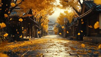 Ginkgo Leaves Falling on a Cobblestone Street in a Japanese Town photo