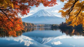 Autumnal View of Mount Fuji Reflected in a Still Lake photo