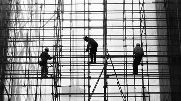 Three Construction Workers on Scaffolding Silhouetted Against a White Background photo