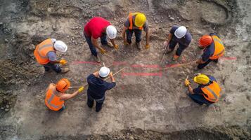 Construction Workers Marking Underground Utilities photo