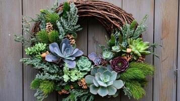 Succulent Wreath Decorated with Pine Branches and Pine Cones photo