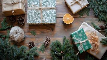 Rustic Christmas Gifts with Pine Branches and Oranges on Wooden Table photo