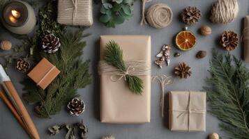 Rustic Christmas Gifts and Decorations on a Grey Background photo