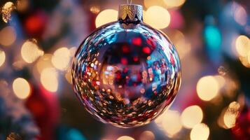 A Shiny Christmas Ornament Reflecting Festive Lights photo