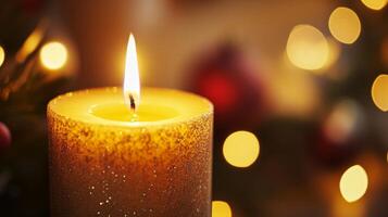 A Close-Up of a Glittering Candle Burning Brightly photo