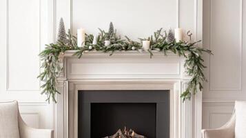 White Fireplace Mantel Decorated with Snowy Greenery and Candles photo
