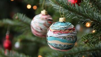 A Colorful Paper Ornament Hanging on a Christmas Tree photo