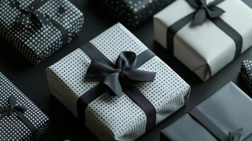 Black and White Gift Boxes with Polka Dot Pattern and Bows photo
