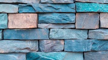 Coarse stone wall texture in turquoise and coral tones for World Ocean Day rugged surface with subtle wave like patterns capturing marine themes and ocean conservation photo