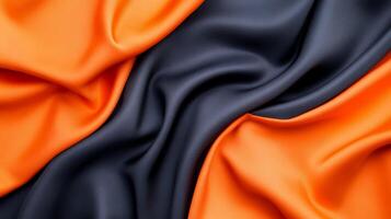 Bright orange and dark grey fabric with bold folds abstract luxury background for Construction Workers Day dynamic and energetic emphasizing strength and skill photo
