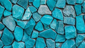 Coarse stone wall texture in turquoise and coral tones for World Ocean Day rugged surface with subtle wave like patterns capturing marine themes and ocean conservation photo