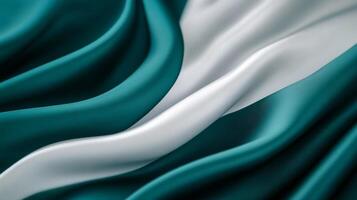 Dark teal and white fabric flowing in fluid waves elegant abstract background for HR Professionals Day calm and balanced reflecting harmony and organization photo