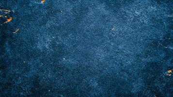 Distressed stone surface in dark blue with white and orange accents for International Astronomy Day grainy texture with scattered star like patterns and subtle celestial vibes photo