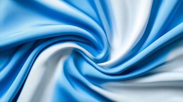 Light blue and white fabric flowing in smooth waves ideal for World Mental Health Day serene and peaceful abstract background promoting calmness and well being photo