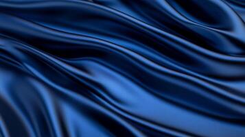 Rich navy blue silk waves with flowing liquid movement smooth texture and deep shadows refined abstract background for New Year or Christmas concepts photo