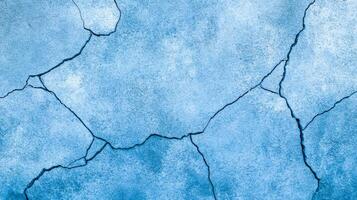 Rough concrete wall texture in vibrant icy blue and silver tones capturing the cool festive essence of New Year abstract cracks and grain for a wintry atmosphere photo