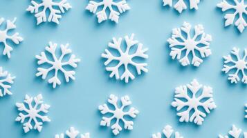 Soft pastel blue and white background with delicate snowflake motifs representing St Nicholas Day in the Netherlands festive and whimsical European holiday for winter designs photo