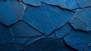 Textured stone surface in shades of deep blue and silver capturing Hanukkah spirit with subtle star engravings and rough grain adding a traditional festive touch photo