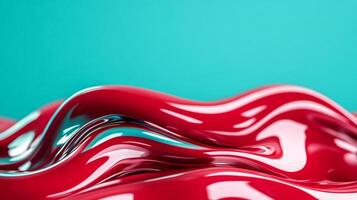 Macro image of vibrant liquid waves in red and turquoise forming abstract shapes photo