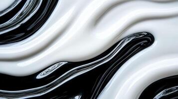 Macro of liquid color waves in black and white ink clashing in a dramatic pattern photo