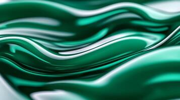 Magnified view of emerald and sapphire liquid waves merging with a smooth gradient effect photo