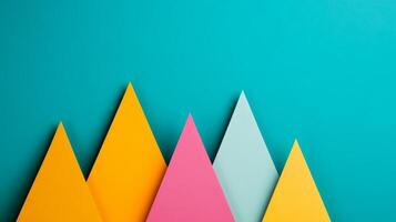Minimalist composition with triangular paper shapes in vibrant colors and thin white lines photo