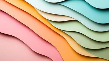 Soft pastel colored paper cut out layers in organic shapes with subtle lines on a textured background photo