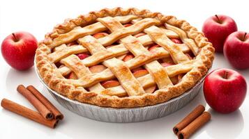 Apple pie with lattice and cinnamon sticks photo