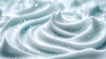 Closeup of a creamy misty white moisturizer with tiny reflective particles evoking the look of snow crystals photo