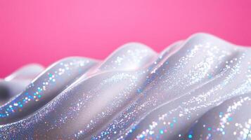 Closeup of a creamy snow white serum with tiny iridescent flakes resembling a glistening winter frost photo