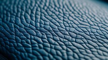Closeup of frosty blue leather with a subtle fine grain texture and a cool matte finish evoking a winter chill photo