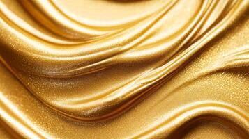 Closeup of golden highlighter cream texture with fine metallic flecks on a smooth surface luxurious beauty product detail photo